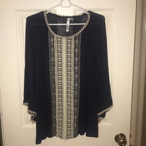 Navy and white patterned blouse